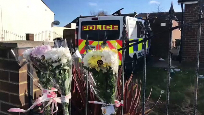 Floral tributes left at the scene where human remains were found in Sunderland