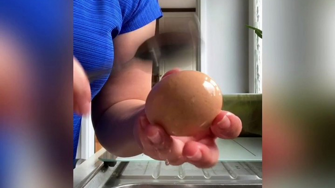 Quickly Cleaning a Hard-Boiled Egg with a Spoon