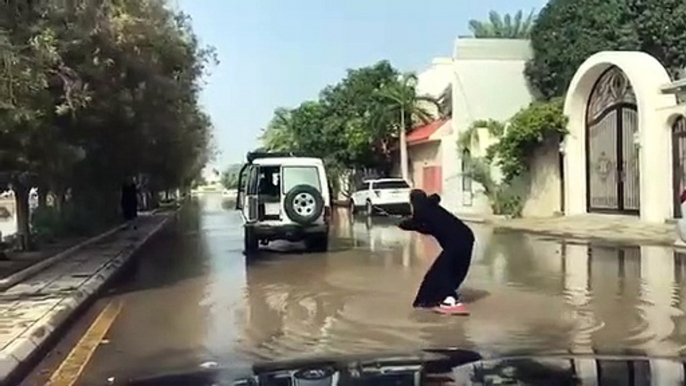 Surfing in dubai by girl on streets || Fun in dubai || Surfing after rain