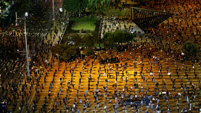 Thousands of Israelis hold socially distant protest against Netanyahu amid coronavirus pandemic