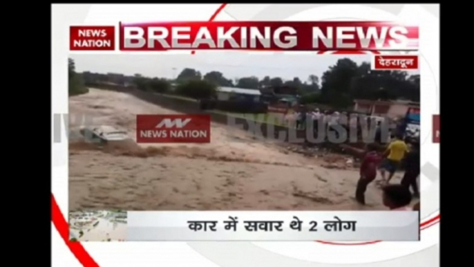 Dehradun: 2 People rescued after car gets swept away during flood