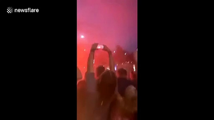 'Championes, Championes, Ole! Ole! Ole!' Liverpool fans sing and light flares after title win