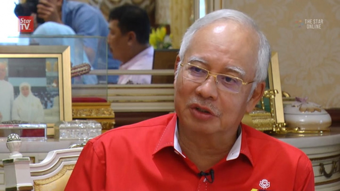 Najib rips his critics
