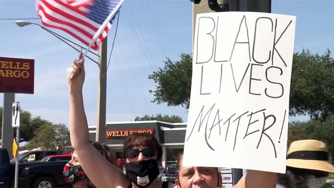 Black Lives Matter, Blue Lives Matter protesters peacefully face off in Clay County