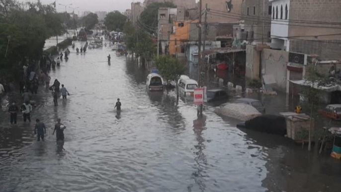 Monsoon rains flood city streets