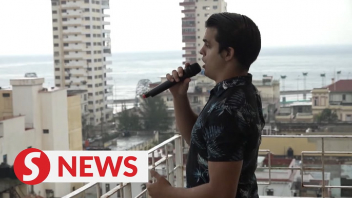 Cuba's rising opera star entertains neighbours during quarantine