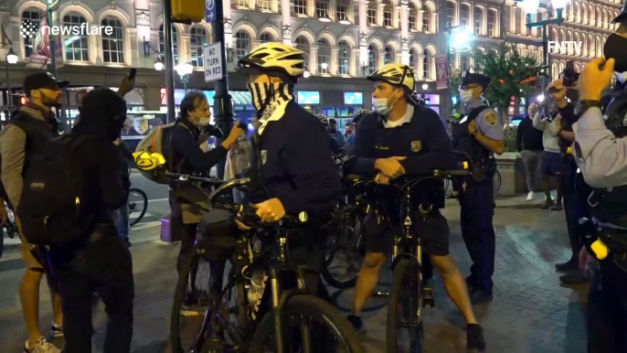 Tensions flare between pro and anti-Trump protesters outside town-hall meeting venue in Philadelphia