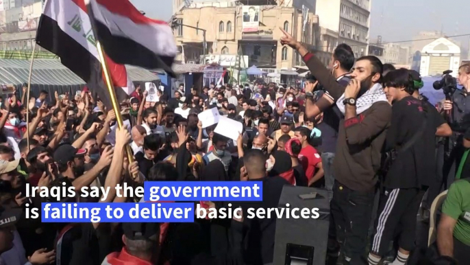 Iraqis in Baghdad rally to revive year-old revolt against the system