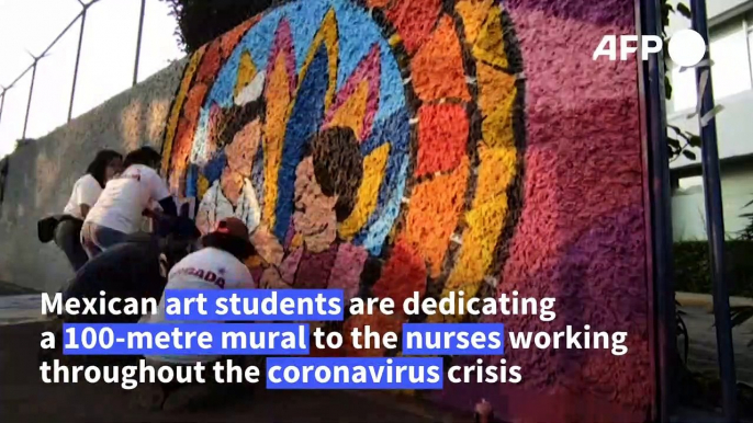 Artists paint mural in Mexico City to honour nurses fighting Covid-19