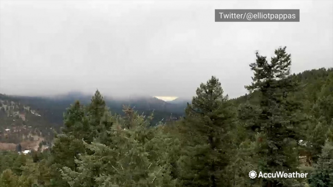 Clouds roll in bringing snow to the Colorado mountains