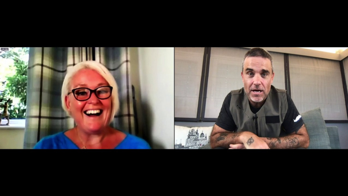 The moment when Robbie Williams surprise Zoom called Kay Lovelady, 48, from Leyland, Lancashire