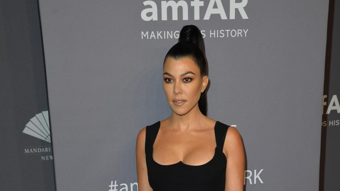 Kourtney Kardashian romancing Travis Barker?