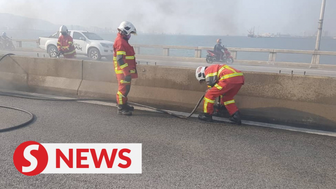 Traffic building up on Penang Bridge due to fire, accident