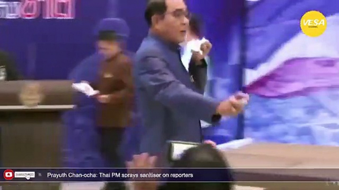 Thai PM sprays sanitiser on reporters