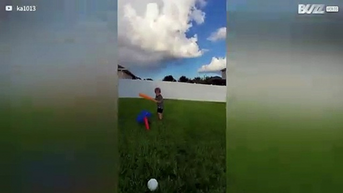 Boy hits dad in the face with ball