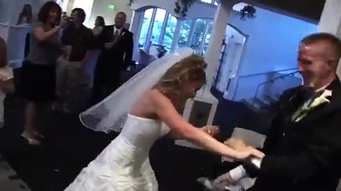 Groom takes things much too far with his bride in brutal wedding cake prank - and shes not
