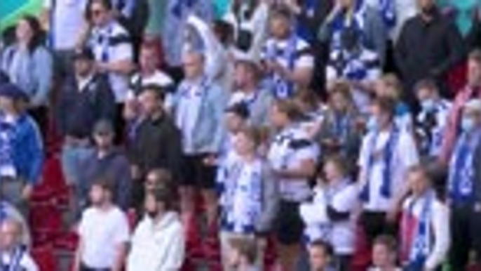 Denmark and Finland fans combine to chant in support of Christian Eriksen