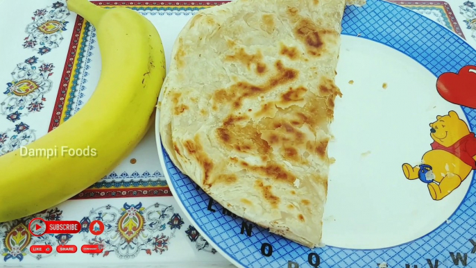 Breakfast with pratha,coffee and banana