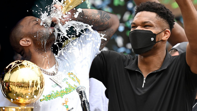 PJ Tucker Gets TOO Lit, Guzzles Champagne By The Mouthful Bucks' NBA Championship Parade