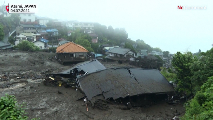 Devastation in Japanese town after landslide sweeps away homes