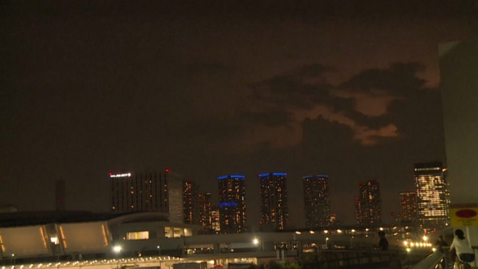 Lightning flashes above Olympics site in Tokyo