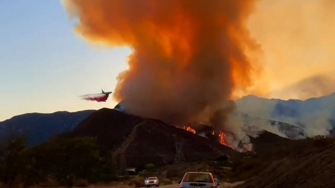 Millions of acres burned as wildfires continue in the West