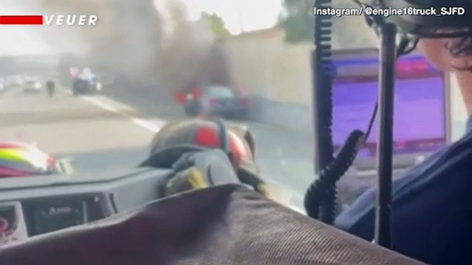 Watch as Rookie Cop Risks Life to Save Driver From Burning Vehicle