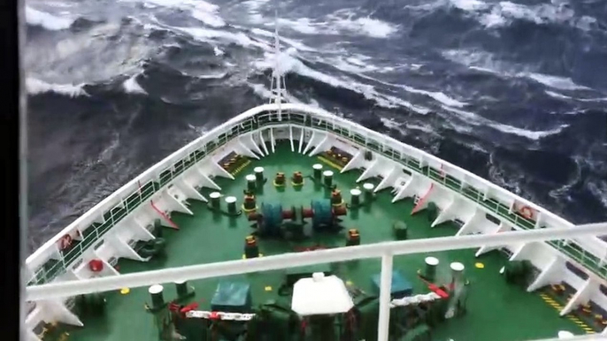 Ship in Storm - Cruise Ship Climbing Up Big Waves