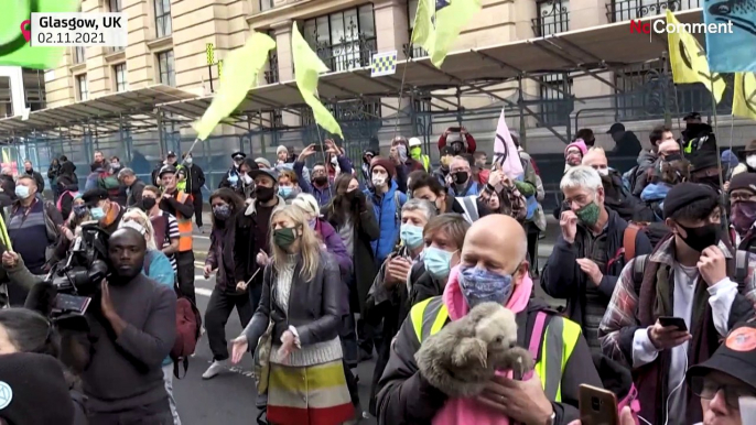 Extinction Rebellion group protests outside JP Morgan in Glasgow