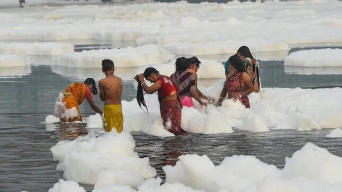 BJP, AAP spar over toxic foam in Yamuna as devotees perform Chhath Puja