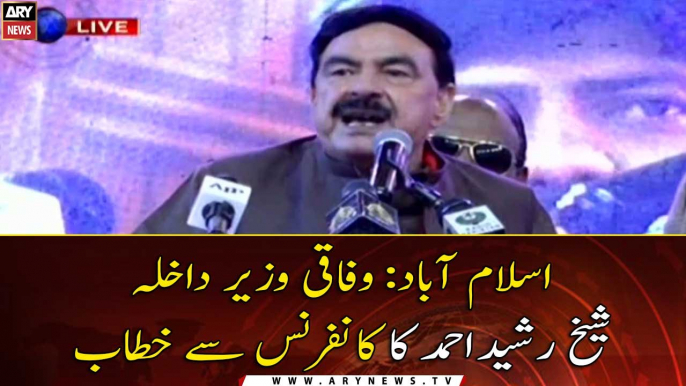 Interior Minister Sheikh Rasheed addresses the conference in Islamabad