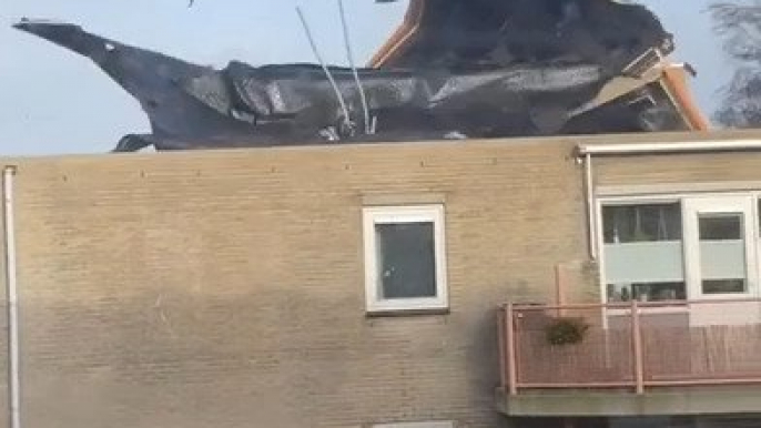 Strong Wind Rips Roof off Building
