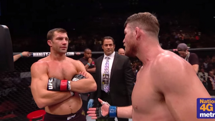 Michael Bisping se moque de Luke Rockhold juste après leur combat à l'UFC 199