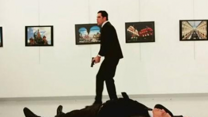 Photographs capture shooting death of Russian ambassador