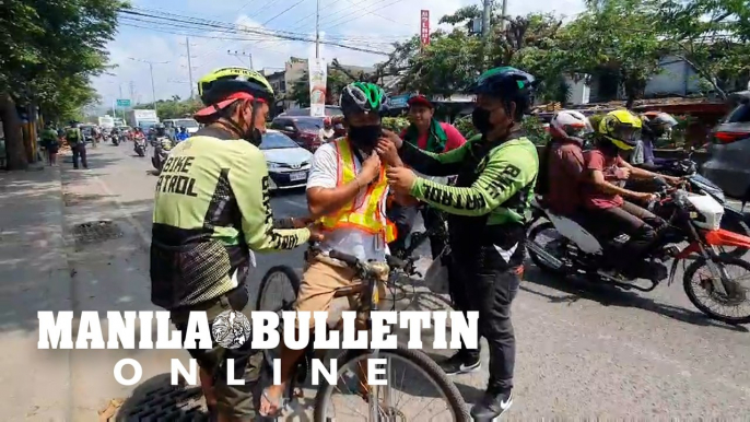 Sugbo Bike Lane Board Bike Patrols give free helmets and reflectorized vests to bike riders in Cebu City