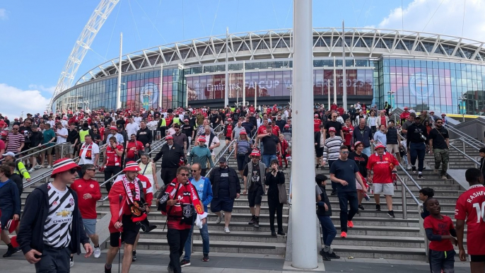Fans leaving Wembley after Man City’s victory at the FA Cup final 2023
