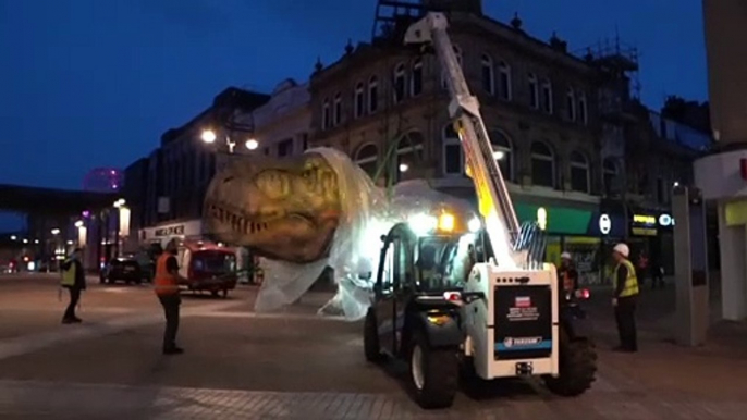 Incredible footage shows enormous dinosaurs being dropped into Trinity Leeds