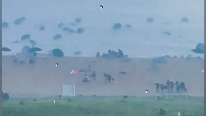 Umbrellas go flying as storm hits coastal Delaware