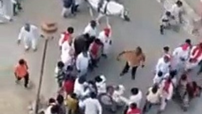 Wedding on streets interrupted by bull fight