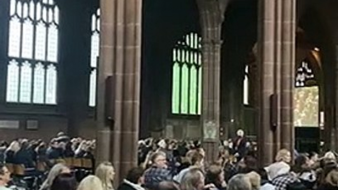 Mourners in Manchester Cathedral watching Queen Elizabeth II's funeral