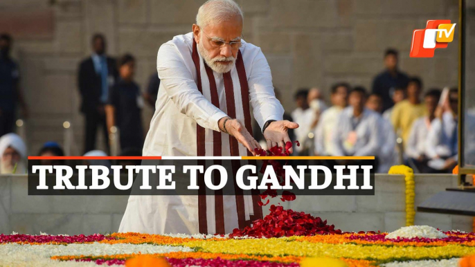 PM Modi Pays Floral Tributes To Mahatma Gandhi At Rajghat