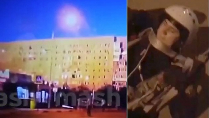 Dramatic video shows final moments of Su-34 bomber as pilots eject seconds before it explodes in a fireball, killing 15 people in Russian apartment block