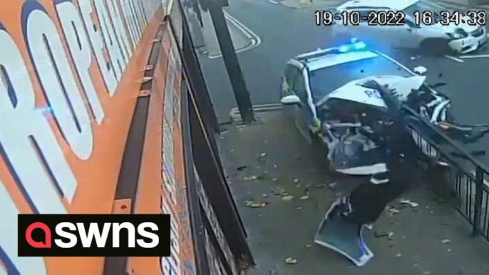 Rapid response police car slams into a railing after colliding with another vehicle