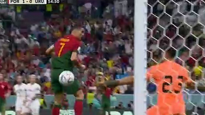 Cristiano Ronaldo celebrates wildly after appearing to give Portugal the lead against Uruguay, only for FIFA to rule the goal to be Bruno Fernandes'... so, did he touch his former Manchester United team-mate's cro