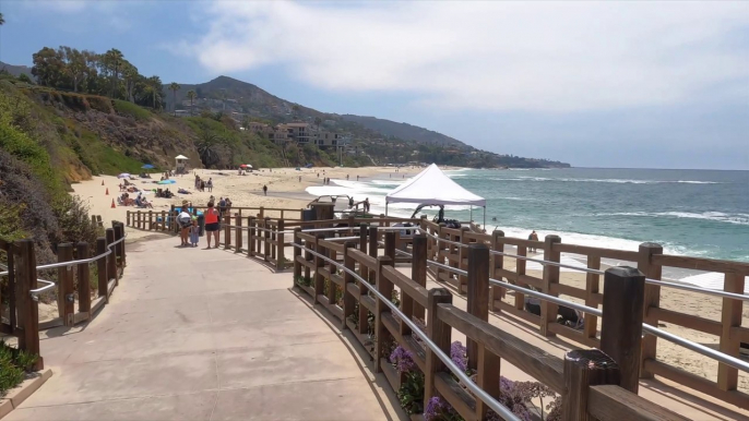 A walk on the beach at Laguna Beach looking at the houses of the rich people.