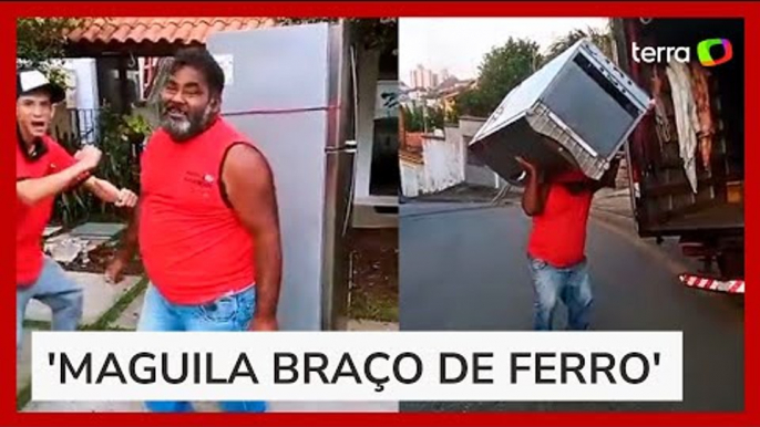 Homem viraliza nas redes sociais ao fazer passinho de funk com geladeira nas costas