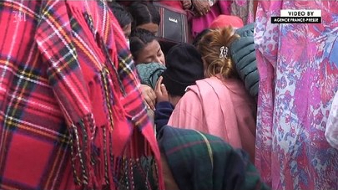 Families of Nepal plane crash victims wait for the release of bodies outside Pokhara hospital