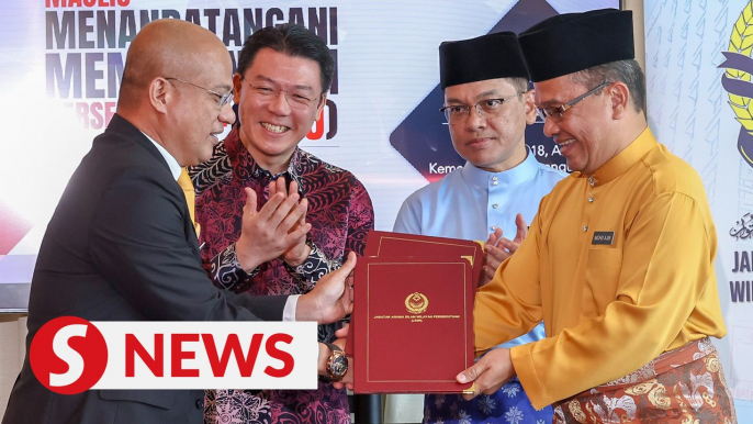 SWCorp, JAWI ink MOU to improve waste management at 845 mosques, surau