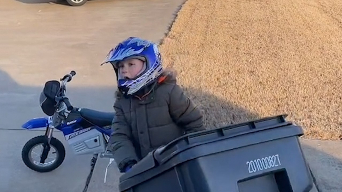 7-YEAR-OLD ENTREPRENEUR set up his own business returning dustbins to his neighbours!