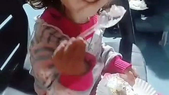 Cute Trishu eating cake on her Aunty birthday